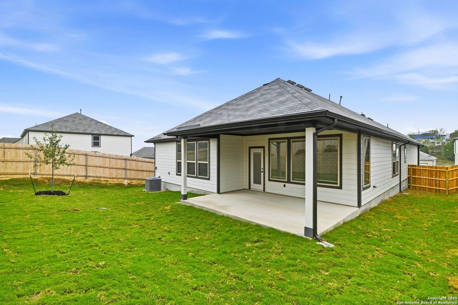 Exterior details and patio area of a home in Vista Ridge, Live Oak (Image 14).