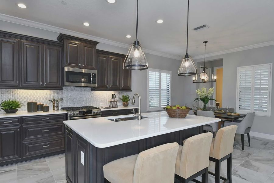 Furnished interior view inside a new home in Boca Royale Golf and Country Club at Wellen Park, Englewood (Image 9).