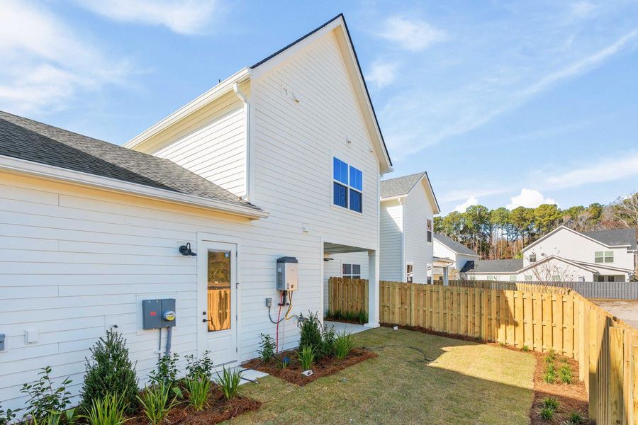 Exterior details and patio area of a home in , Johns Island (Image 34).