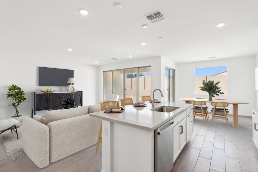 Great room, kitchen & dining - Timeless Collection. Virtually staged. Finishes may vary by community