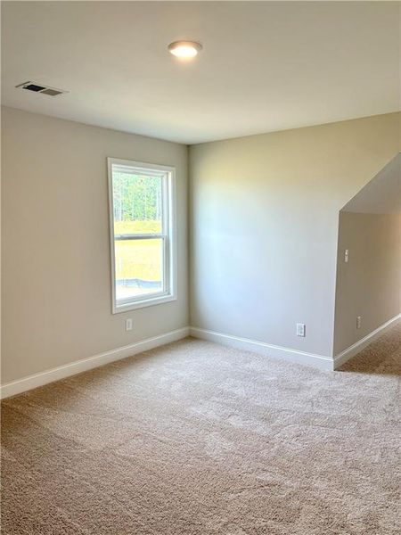 Spacious, unfurnished interior of a new home in Heritage Pointe at The Georgian, Villa Rica (Image 19).