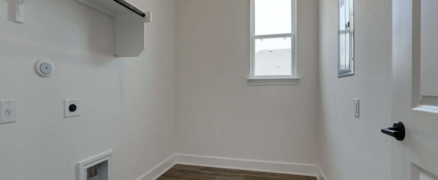 Image 22 representing the Ellington by Ashton Woods in Megan's Landing 70's, Castroville, TX.