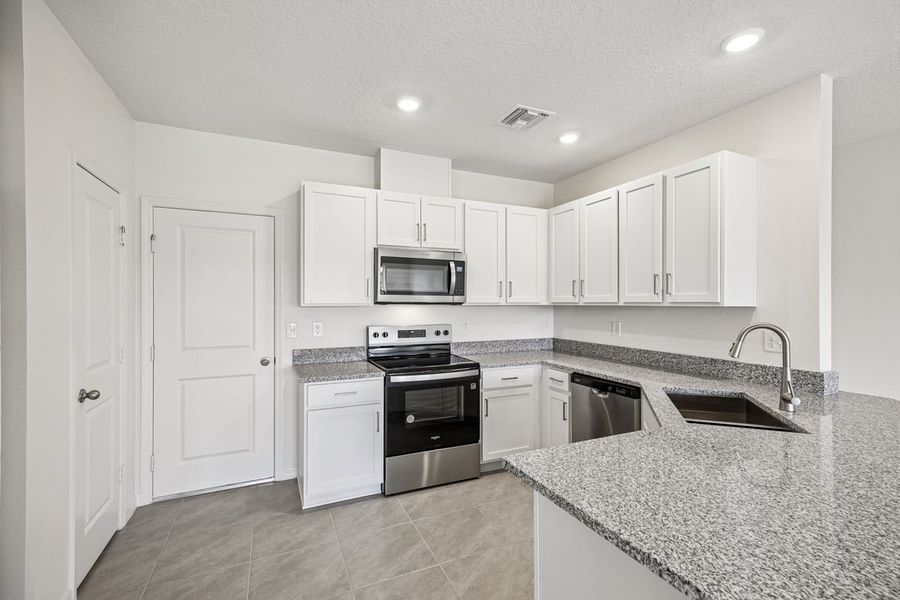Furnished interior view inside a new home in Reserve at Forest Lake Townhomes, Lake Wales (Image 7). Furnished interior view inside a new home in Reserve at Forest Lake Townhomes, Lake Wales (Image 7).