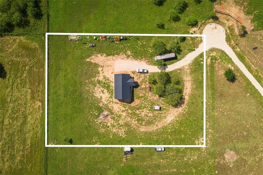 Aerial overview of property's location featuring property boundaries highlighted