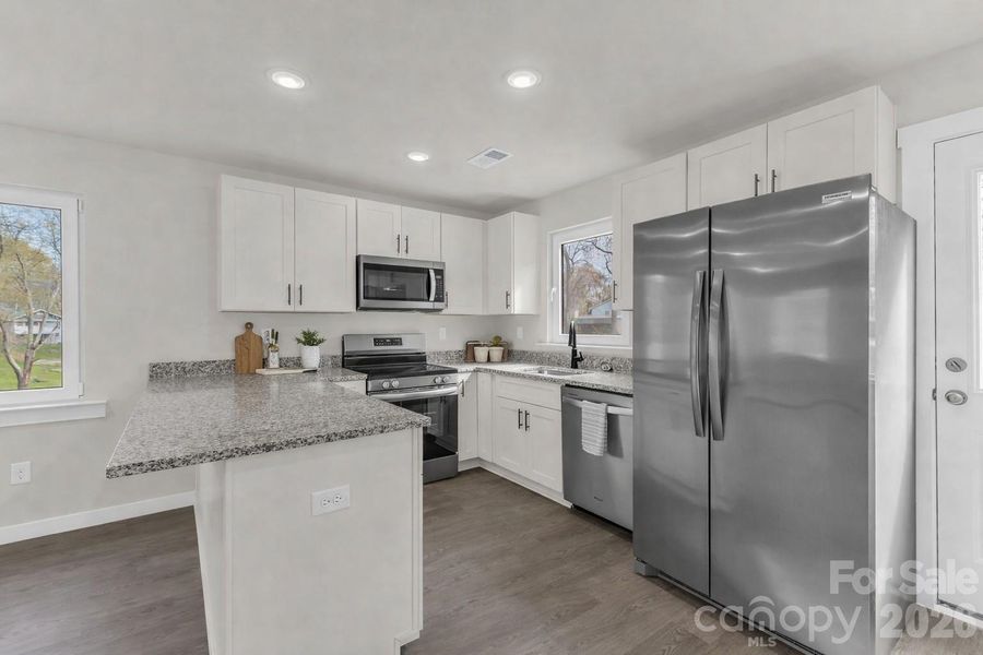 Furnished interior view inside a new home in , Statesville (Image 7).