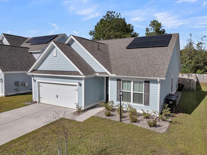 Front exterior of a new home in Abbey Walk, Moncks Corner, SC, highlighting curb appeal (Image 1).