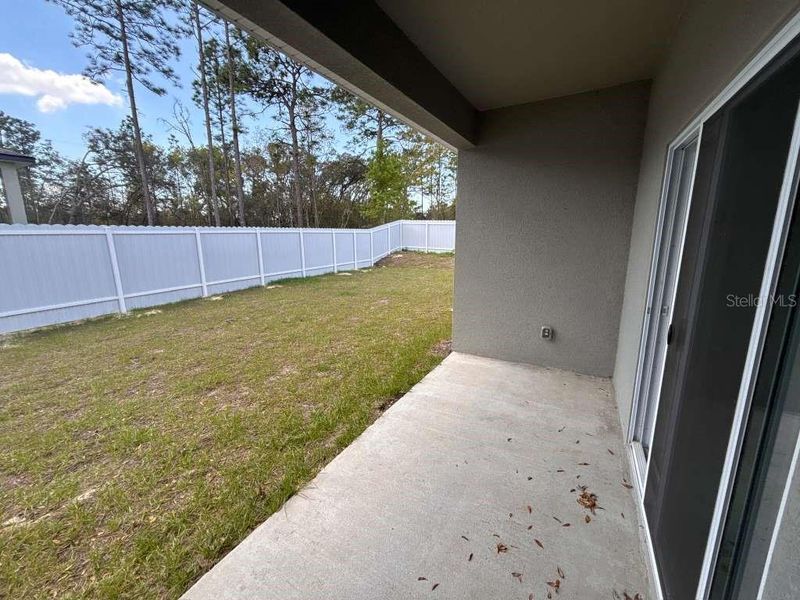 Exterior details and patio area of a home in , Citrus Springs (Image 18).