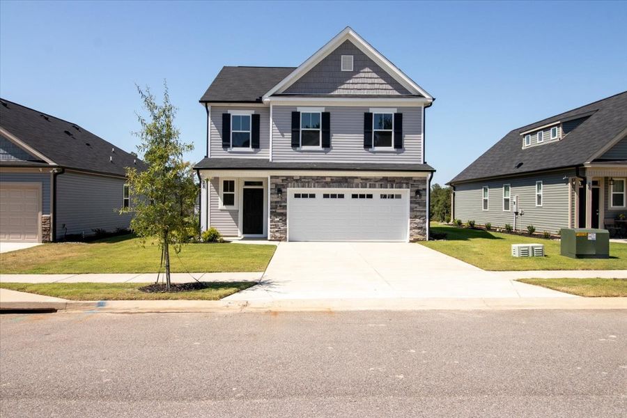 Front exterior of a new home in Windsor, North Augusta, SC, highlighting curb appeal (Image 1).
