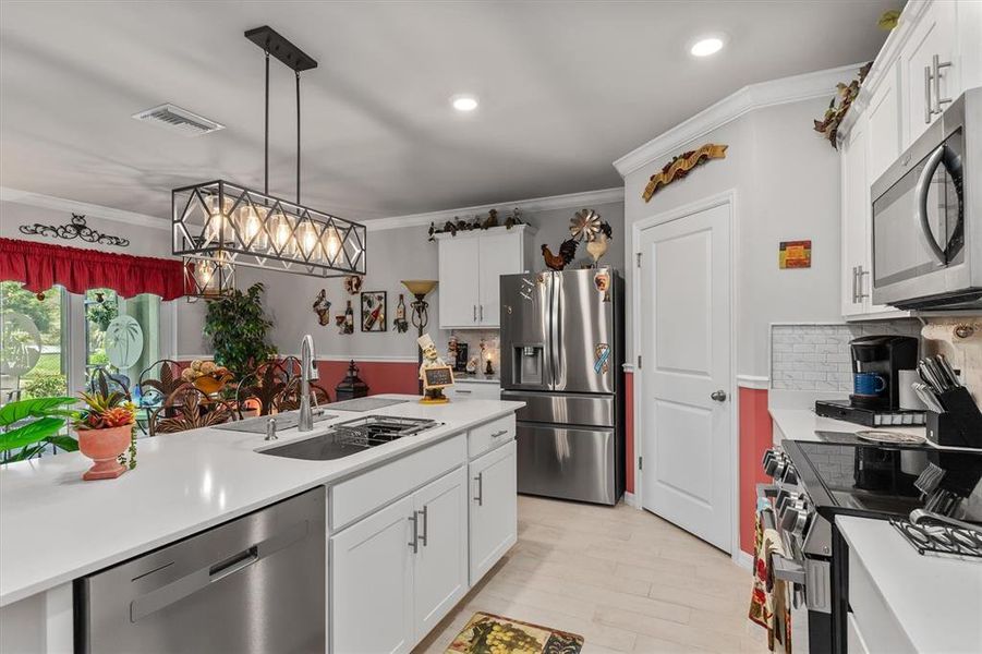 Furnished interior view inside a new home in Burnt Store Village, Punta Gorda (Image 15).