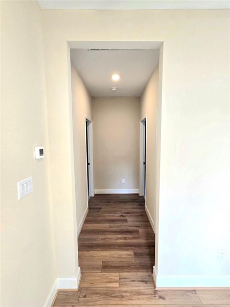 Hallway leading to guest bedrooms Hallway leading to guest bedrooms
