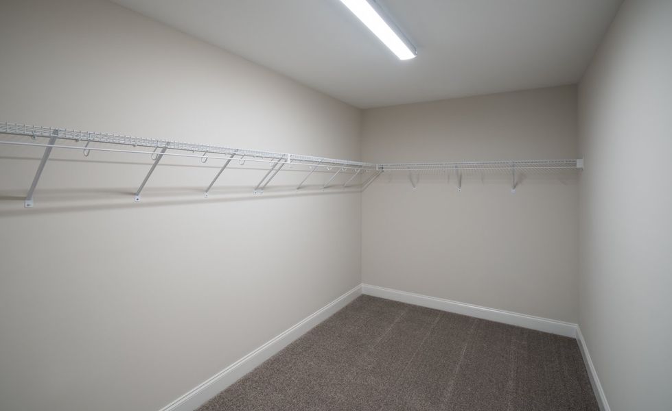 Representative unfurnished interior of a home built from the The Calle by Cothran Homes in Holly Ridge, Greenville (Image 19). Representative unfurnished interior of a home built from the The Calle by Cothran Homes in Holly Ridge, Greenville (Image 19).