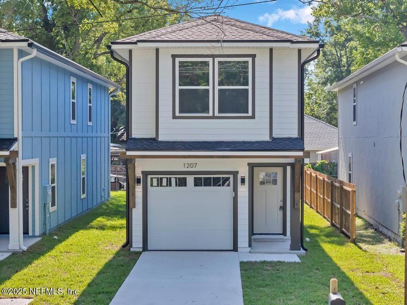 Front exterior of a new home in , Jacksonville, FL, highlighting curb appeal (Image 21).