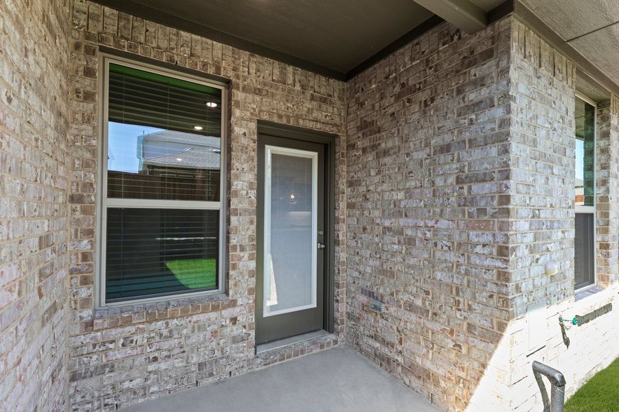 Front exterior of a new home in Sereno Oaks, Dallas, TX, highlighting curb appeal (Image 29). Front exterior of a new home in Sereno Oaks, Dallas, TX, highlighting curb appeal (Image 29).