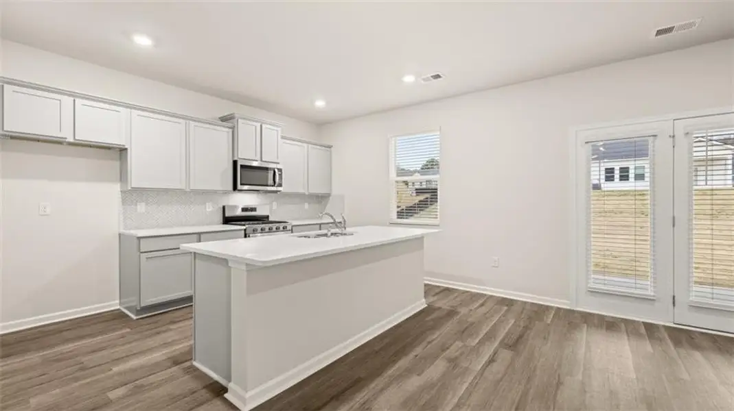 Furnished interior view inside a new home in Preserve at Dove Creek, Statham (Image 23).