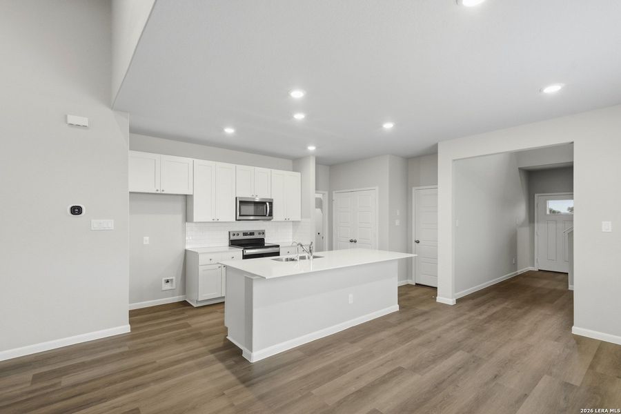 Furnished interior view inside a new home in Abbott Place, St. Hedwig (Image 12).