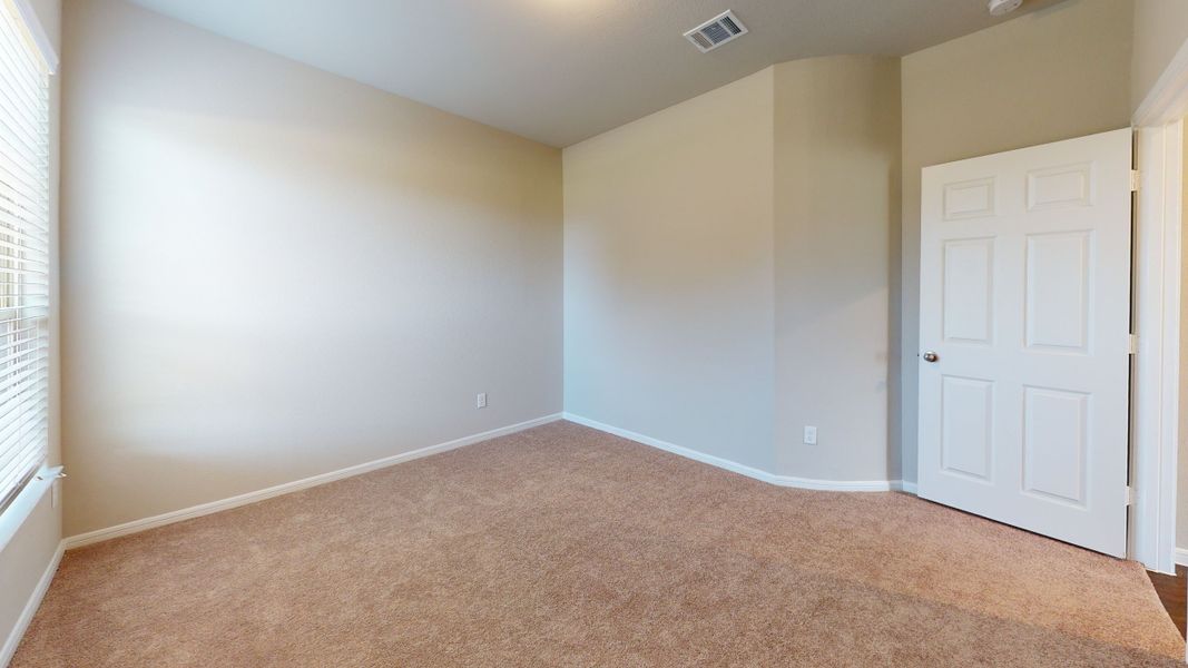 Representative unfurnished interior of a home built from the Floor Plan 3256 by Colina Homes in Grand Magnolia, Magnolia (Image 63).
