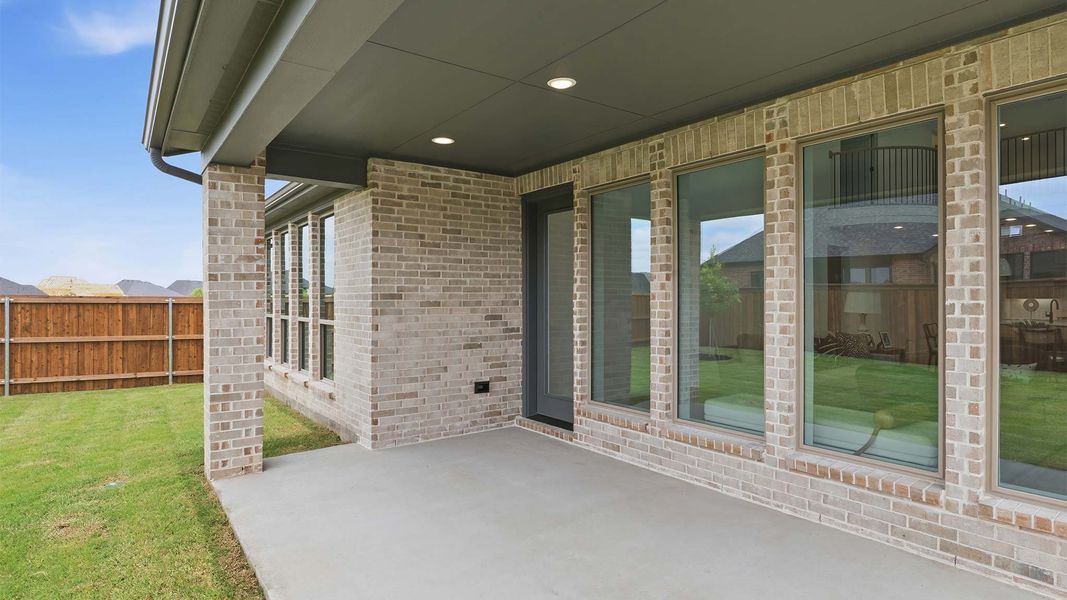Exterior details and patio area of a home in Mosaic, Celina (Image 2). Exterior details and patio area of a home in Mosaic, Celina (Image 2).