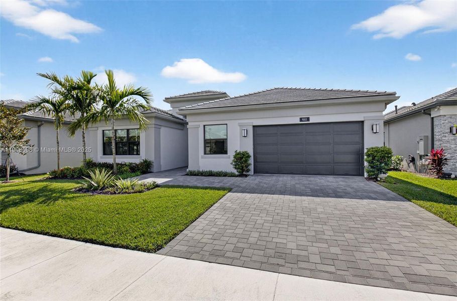 Front exterior of a new home in , Boynton Beach, FL, highlighting curb appeal (Image 30).