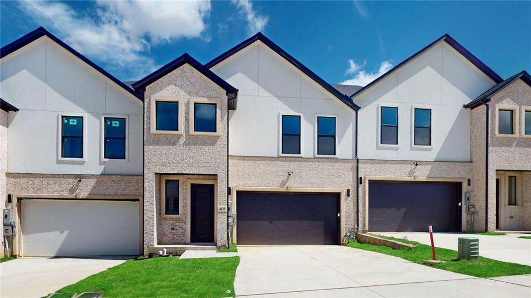 Front exterior of a new home in , Irving, TX, highlighting curb appeal (Image 2). Front exterior of a new home in , Irving, TX, highlighting curb appeal (Image 2).