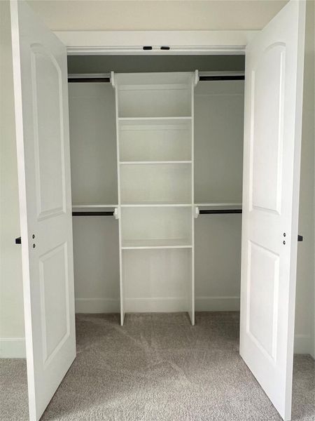 Custom built-in shelves in bedroom #1 closet