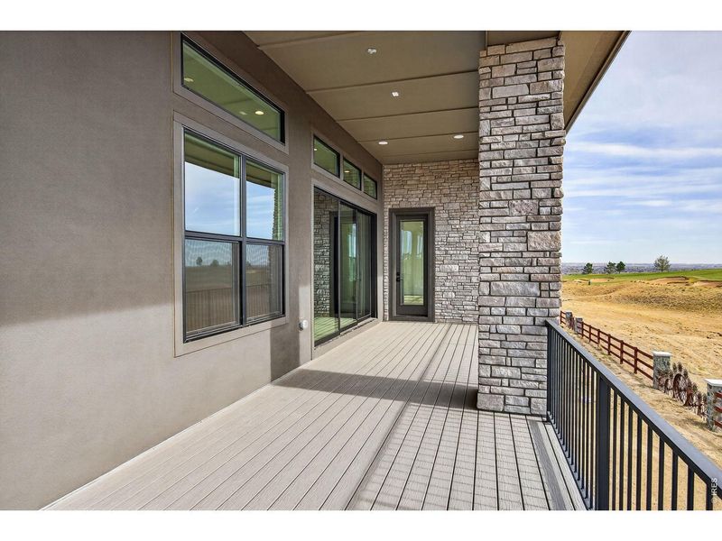 Exterior details and patio area of a home in RainDance, Windsor (Image 26).