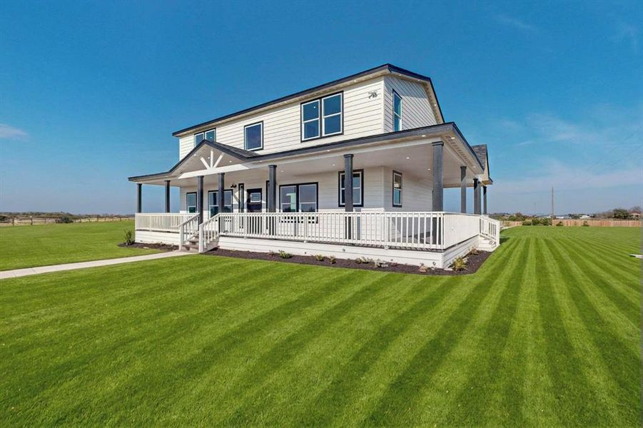 Front exterior of a new home in , Abbott, TX, highlighting curb appeal (Image 29). Front exterior of a new home in , Abbott, TX, highlighting curb appeal (Image 29).