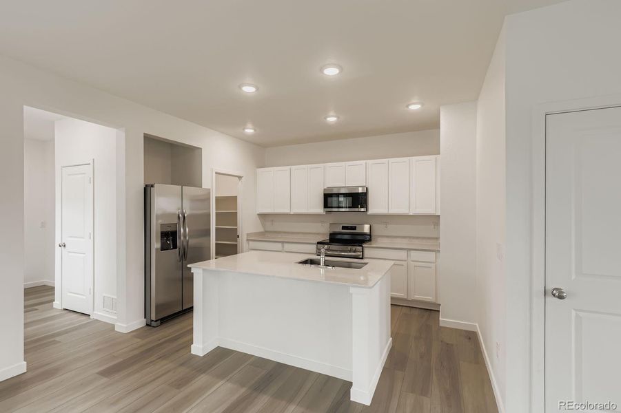 Furnished interior view inside a new home in Eastcreek Farm: Paired Homes, Thornton (Image 4).