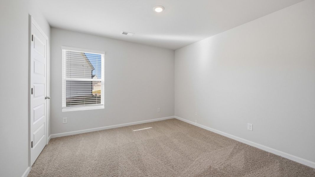 Spacious, unfurnished interior of a new home in The Reserve at Calcutta, Stockbridge (Image 25).