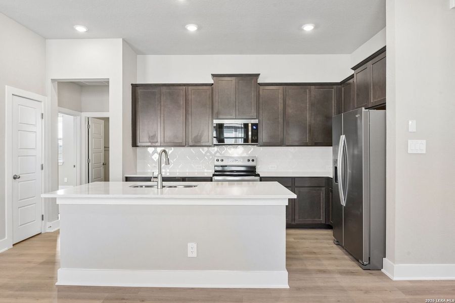 Furnished interior view inside a new home in Royal Crest, San Antonio (Image 11).