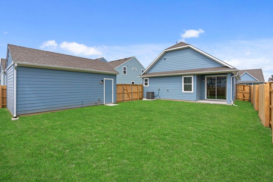 Rear of Home and Private Backyard