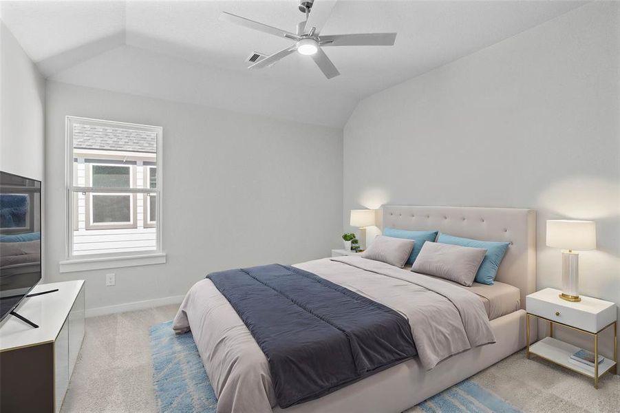 Secondary bedroom features plush carpet, custom paint, ceiling fan with lighting and a large window with privacy blinds.