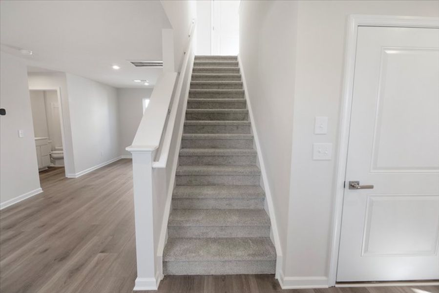 Spacious, unfurnished interior of a new home in Wren Woods 2-Story, Gray Court (Image 23).