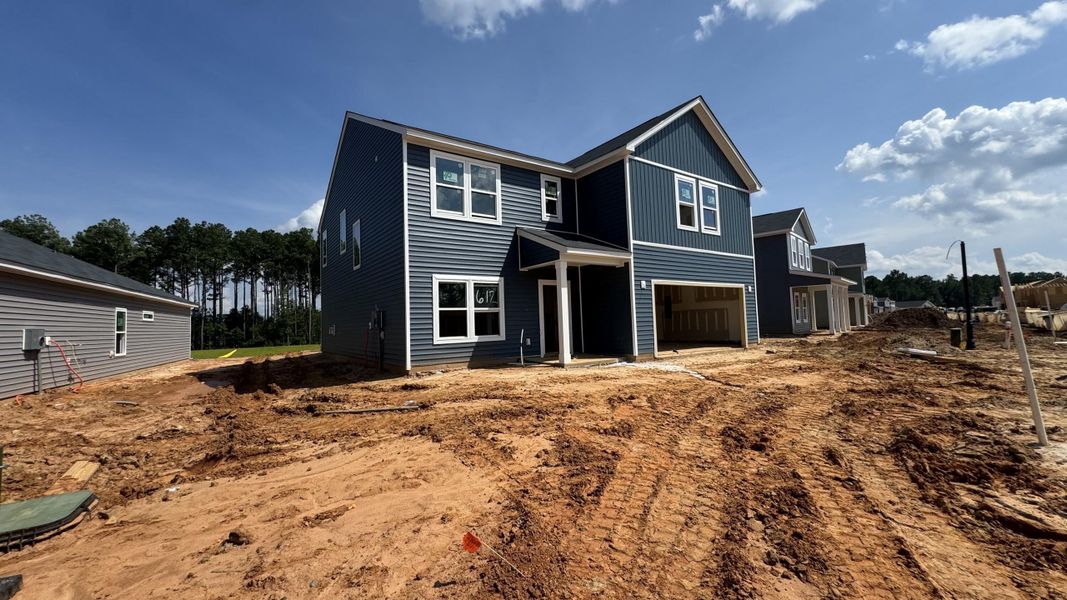Front exterior of a new home in Watson Hill, Summerville, SC, highlighting curb appeal (Image 28).