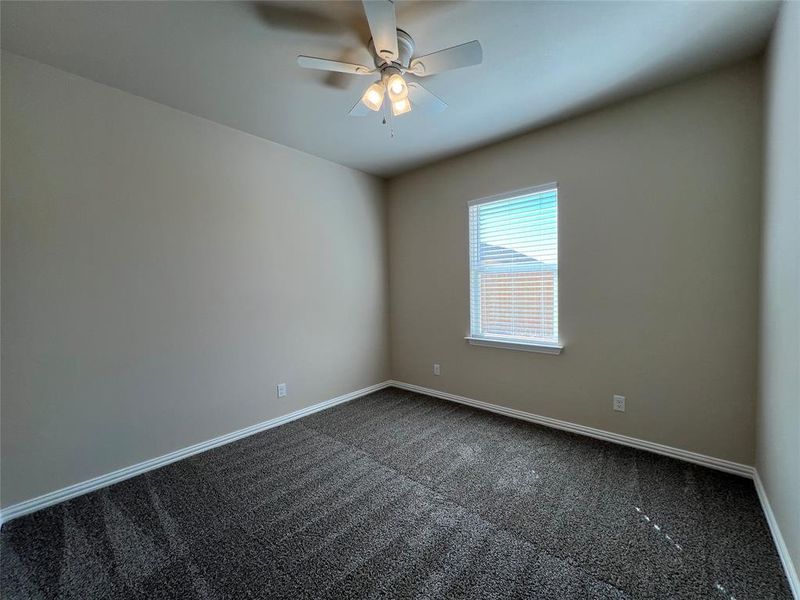 Bedroom 2, Carpeted empty room with ceiling fan