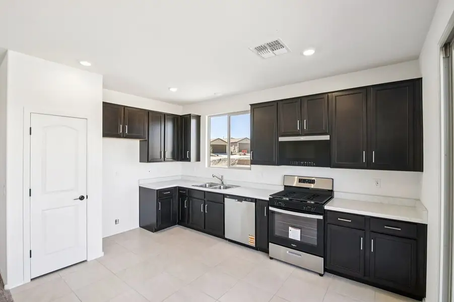 Furnished interior view inside a new home in Saguaro Haven, Tucson (Image 3).