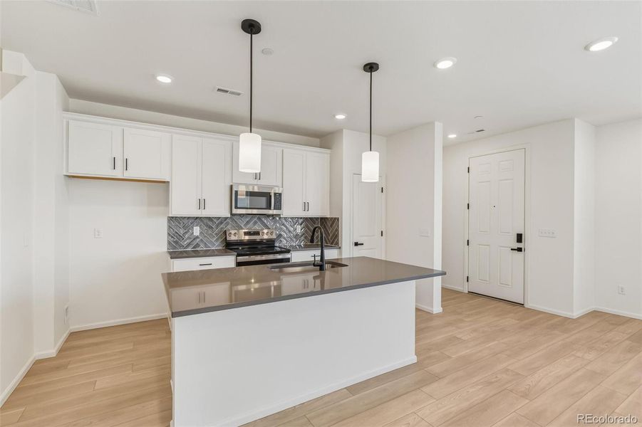 Furnished interior view inside a new home in Turnberry, Commerce City (Image 16).