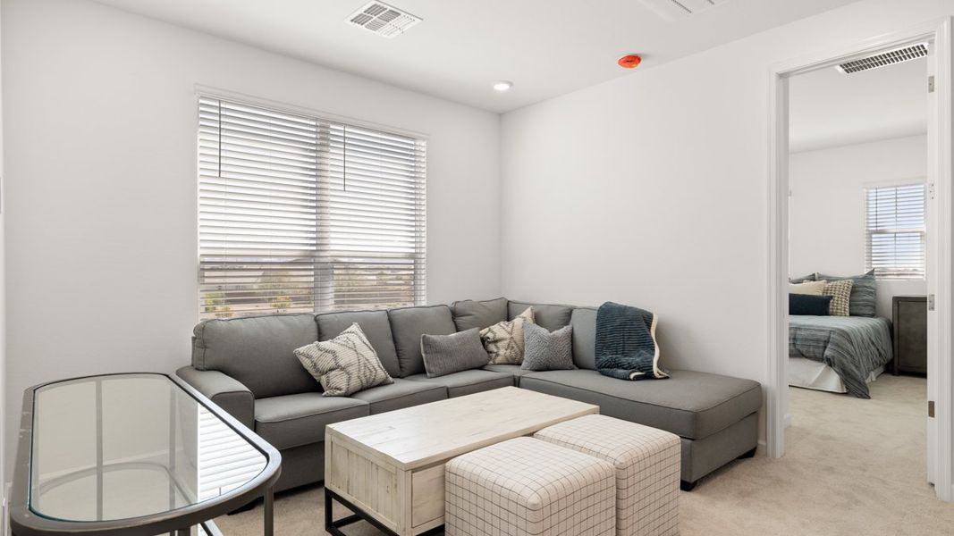Representative furnished interior of a home built from the Crow by D.R. Horton in Apache Farms, Buckeye (Image 17).