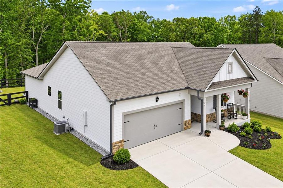 Front exterior of a new home in Lost Creek, Dallas, GA, highlighting curb appeal (Image 25).
