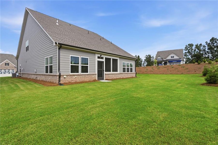 Exterior details and patio area of a home in The Court at Gainesville Township, Gainesville (Image 24).