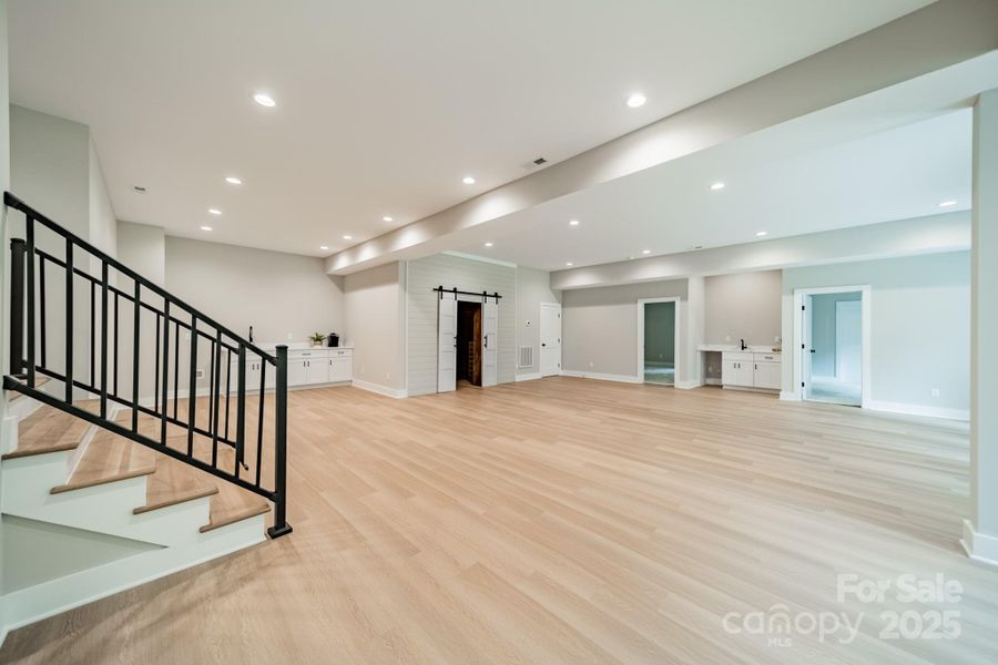 The Lower Level Living room is expansive and leads you to Lake Norman