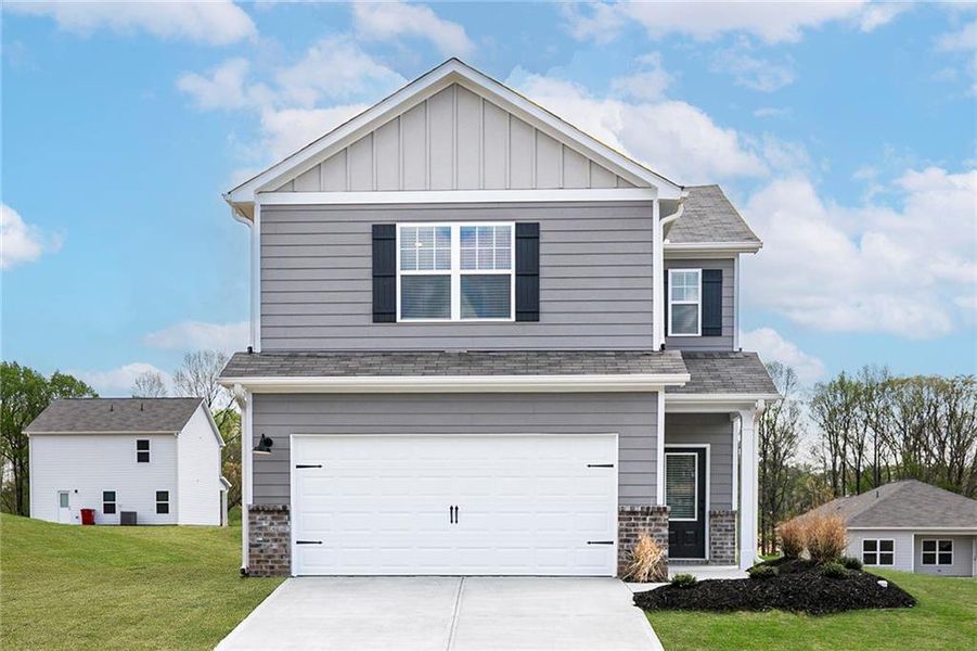 Front exterior of a new home in Lake Preserve at Jackson Trail, Jefferson, GA, highlighting curb appeal (Image 1). Front exterior of a new home in Lake Preserve at Jackson Trail, Jefferson, GA, highlighting curb appeal (Image 1).