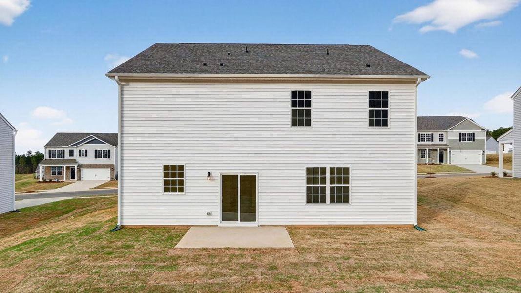 Exterior details and patio area of a home in Olive Branch, Wilson's Mills (Image 24).