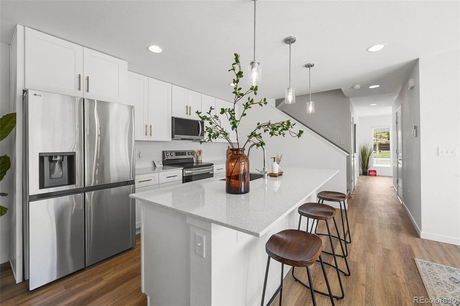 All photos are of a similar staged unit.