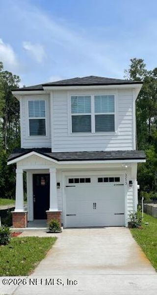 Front exterior of a new home in , Jacksonville, FL, highlighting curb appeal (Image 1). Front exterior of a new home in , Jacksonville, FL, highlighting curb appeal (Image 1).
