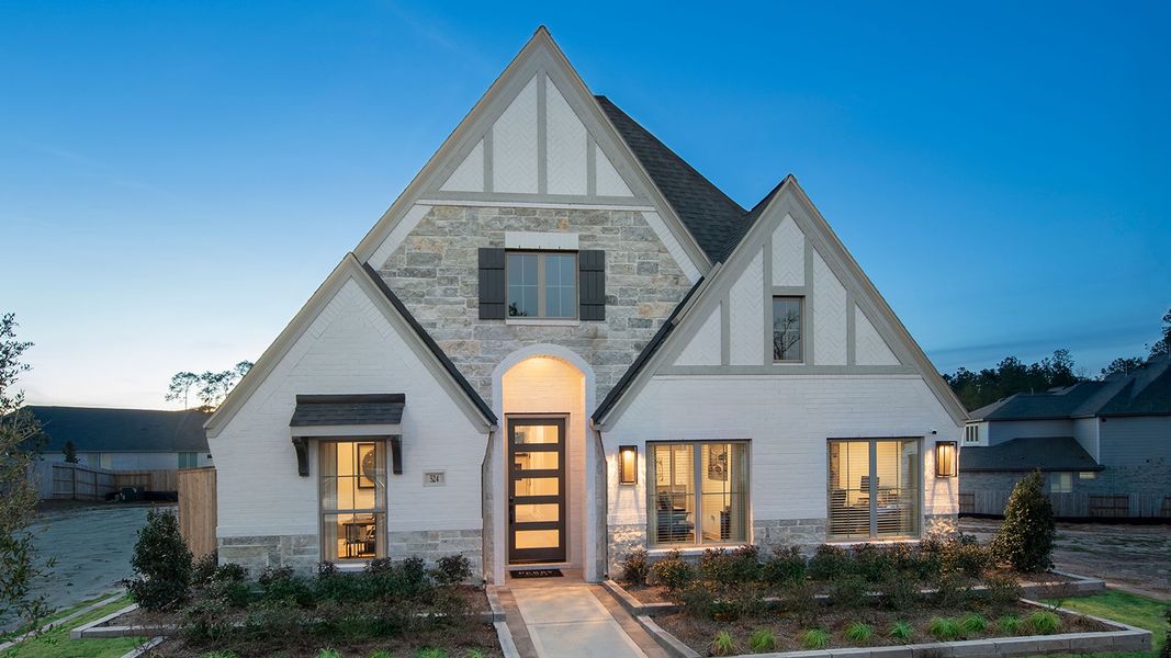 Front exterior of a new home in Candela, Richmond, TX, highlighting curb appeal (Image 23).