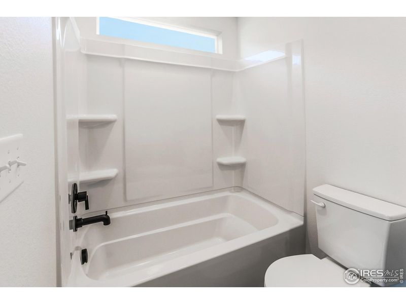 Furnished interior view inside a new home in Bloom Trailblazer Collection - Single Family Homes, Fort Collins (Image 7).