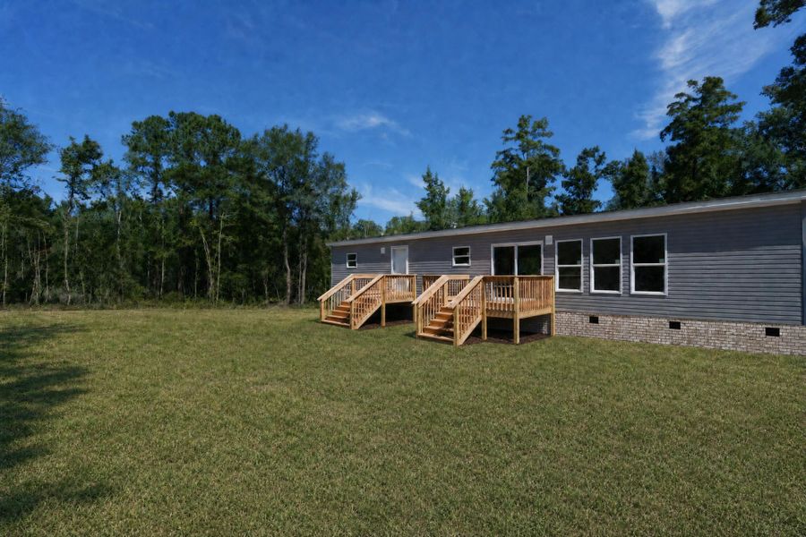 Exterior details and patio area of a home in , Walterboro (Image 22).