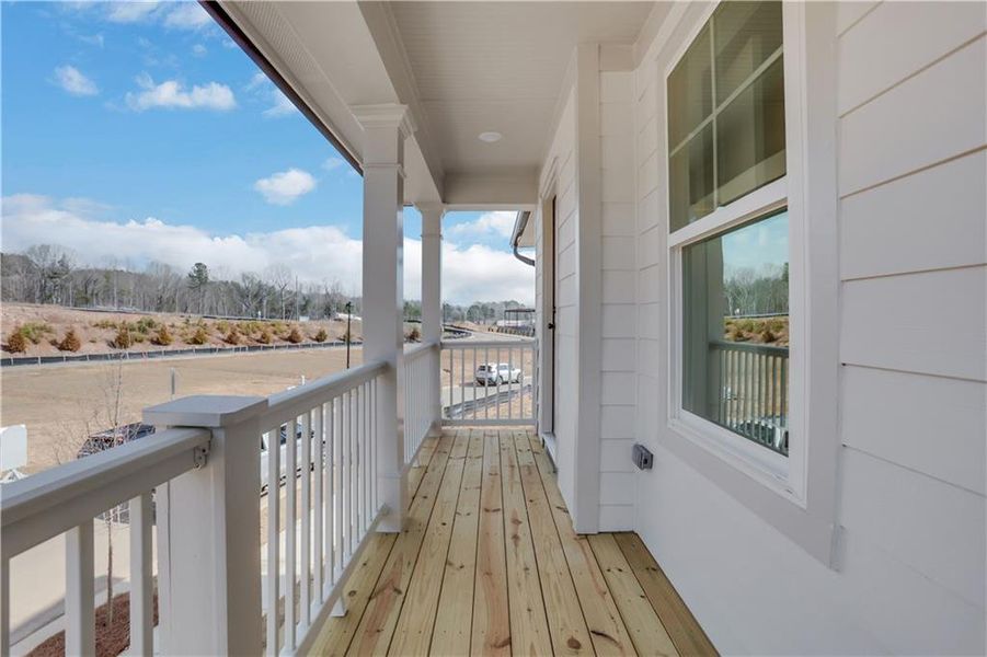 Exterior details and patio area of a home in Marble Tree, Ball Ground (Image 3).