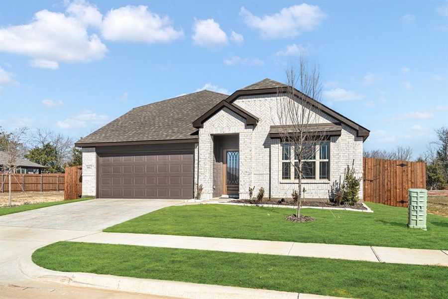 Front exterior of a new home in Georgetown at Kings Fort, Kaufman, TX, highlighting curb appeal (Image 26).