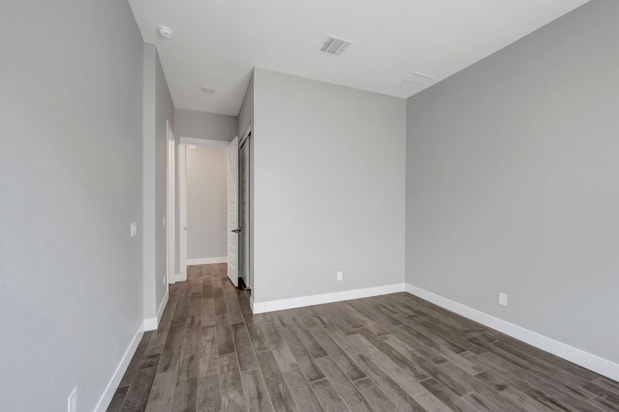 Spacious, unfurnished interior of a new home in Blossom Rock, Apache Junction (Image 37). Spacious, unfurnished interior of a new home in Blossom Rock, Apache Junction (Image 37).